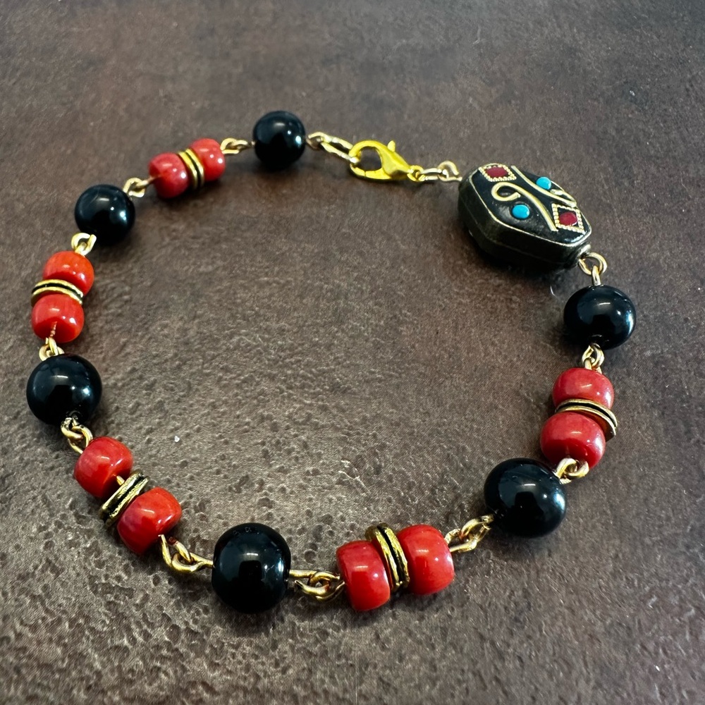 Handmade Natural Orange Coral and Black Onyx Beaded Bracelet